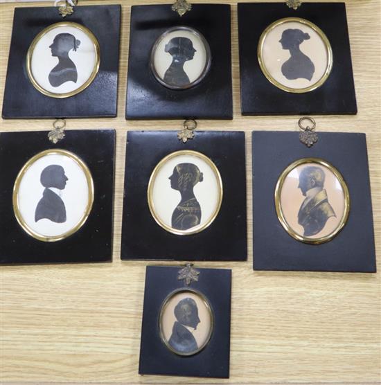 Seven 19th century silhouette profile portraits, ebonised frames